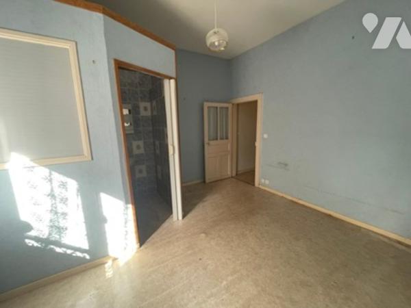 UNE MAISON A USAGE D'HABITATION