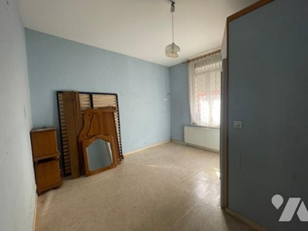 UNE MAISON A USAGE D'HABITATION