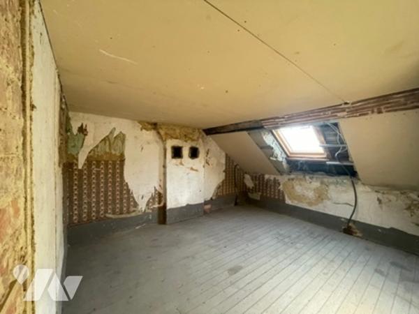 UNE MAISON A USAGE D'HABITATION