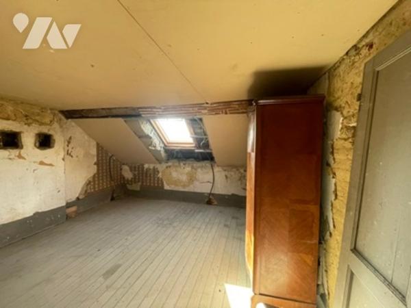 UNE MAISON A USAGE D'HABITATION