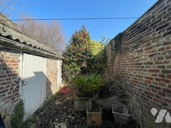 UNE MAISON A USAGE D'HABITATION