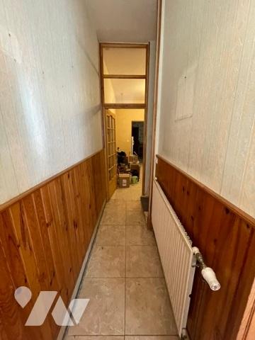 UNE MAISON A USAGE D'HABITATION