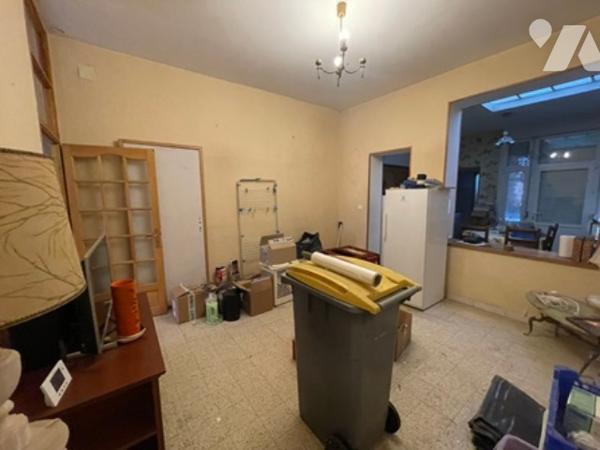 UNE MAISON A USAGE D'HABITATION