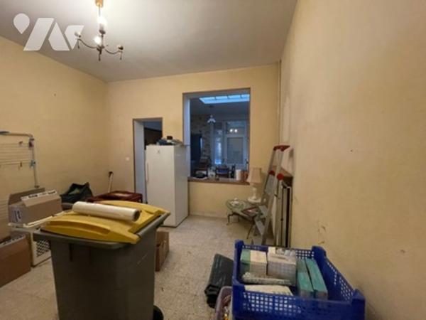 UNE MAISON A USAGE D'HABITATION