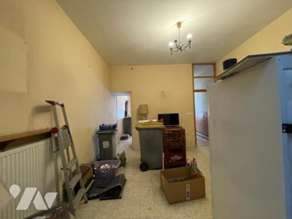 UNE MAISON A USAGE D'HABITATION