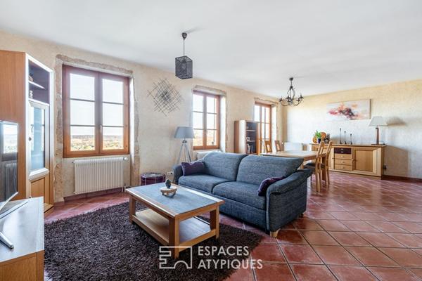 Appartement au dernier étage dans une bâtisse en pierres