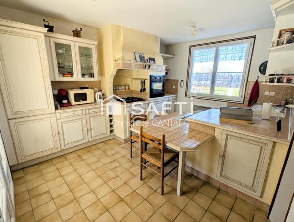 Maison 87m², 3 chambres, garage, terrain.