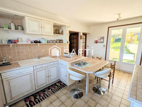 Maison 87m², 3 chambres, garage, terrain.