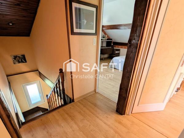 Maison 87m², 3 chambres, garage, terrain.