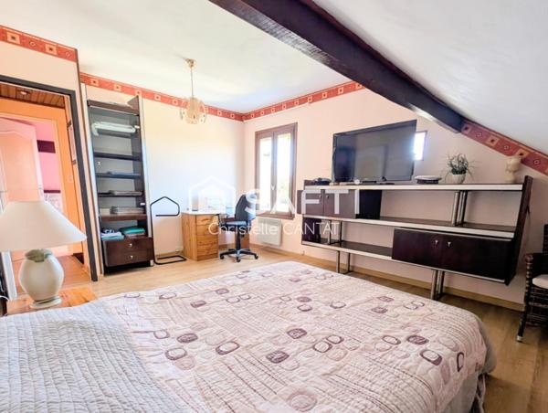 Maison 87m², 3 chambres, garage, terrain.