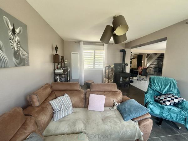 MAISON COUP DE COEUR  AVEC GARAGE.