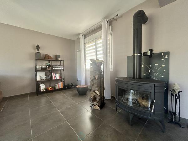 MAISON COUP DE COEUR  AVEC GARAGE.