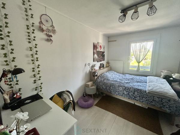MAISON COUP DE COEUR  AVEC GARAGE.