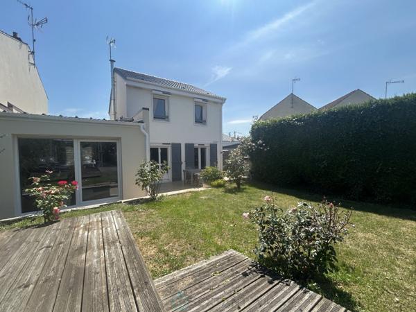 MAISON COUP DE COEUR  AVEC GARAGE.