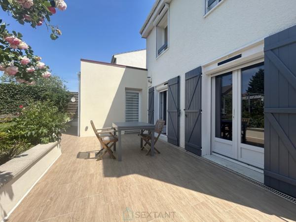 MAISON COUP DE COEUR  AVEC GARAGE.