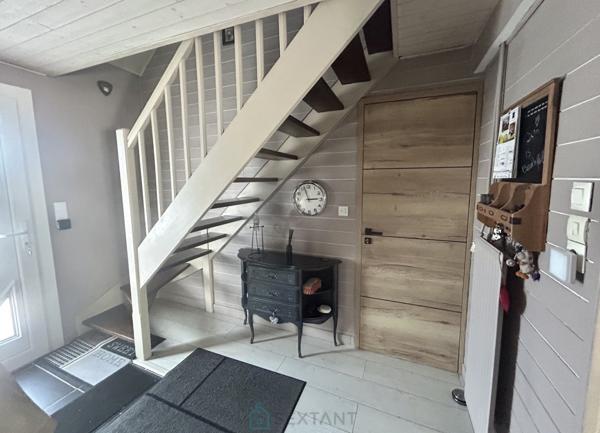 MAISON COUP DE COEUR  AVEC GARAGE.