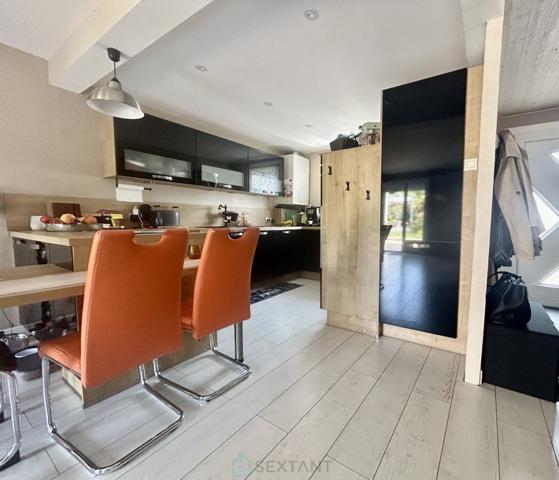 MAISON COUP DE COEUR  AVEC GARAGE.
