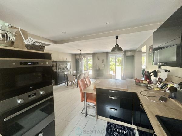 MAISON COUP DE COEUR  AVEC GARAGE.