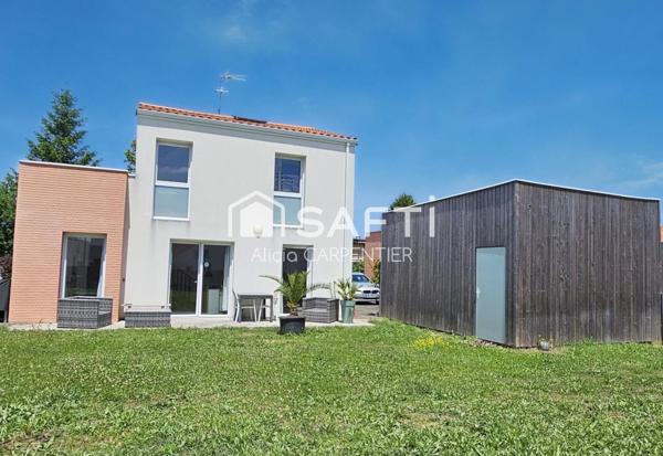 Maison récente avec 4 chambres et un garage