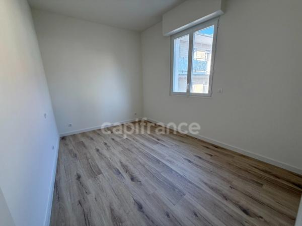 Appartement refait à neuf avec parking et ascenseur