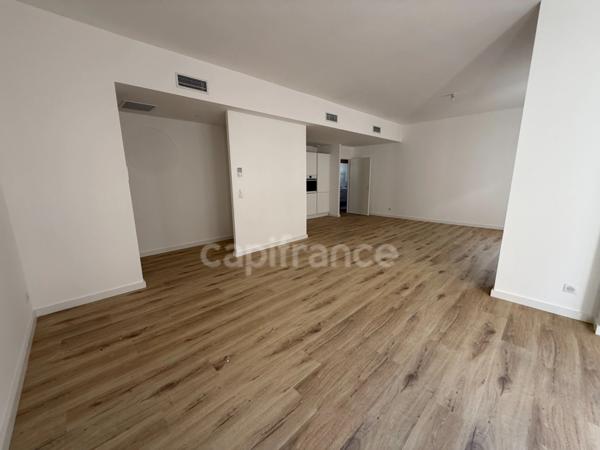 Appartement refait à neuf avec parking et ascenseur