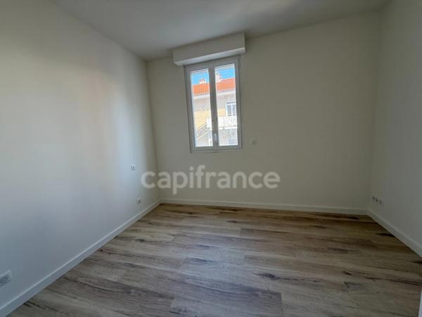 Appartement refait à neuf avec parking et ascenseur