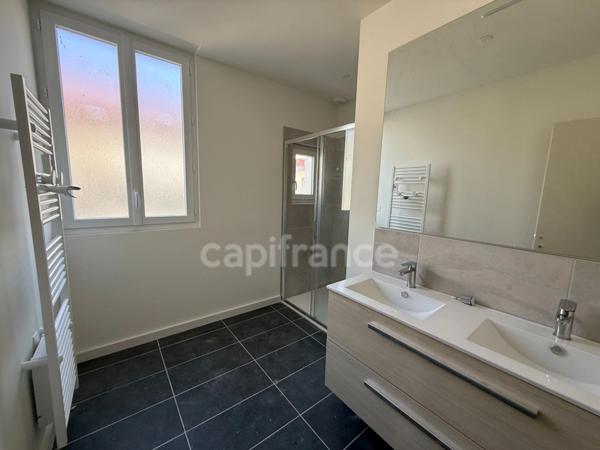 Appartement refait à neuf avec parking et ascenseur