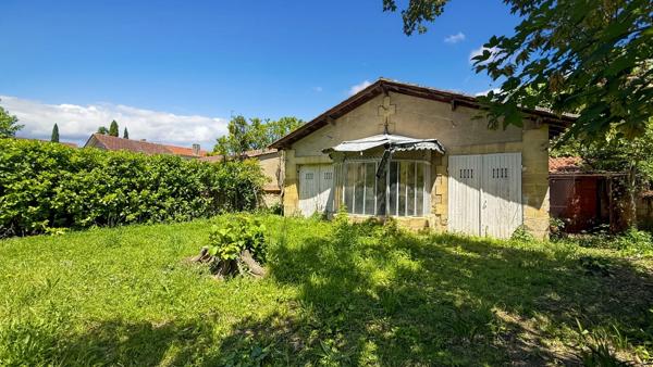 Maison de caractère en pierre en plein centre-ville de Bergerac - 189 m², 5 chambres, jardin clos et dépendance sur parcelle de 550 m²