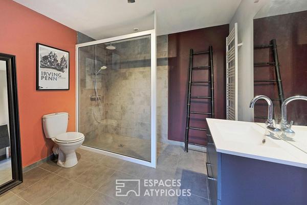 Maison de caractère revisitée avec double jardin et volumes de vie ouverts