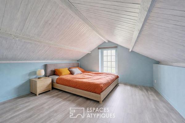 Maison de caractère revisitée avec double jardin et volumes de vie ouverts