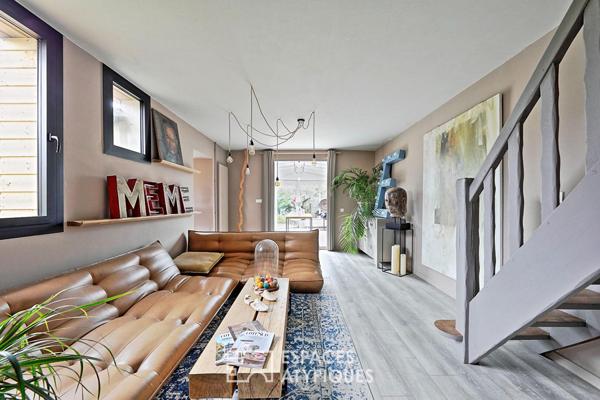 Maison de caractère revisitée avec double jardin et volumes de vie ouverts