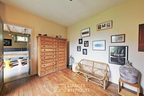 Maison de caractère revisitée avec double jardin et volumes de vie ouverts