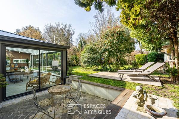 Corps de ferme rénové au coeur du village et son jardin secret