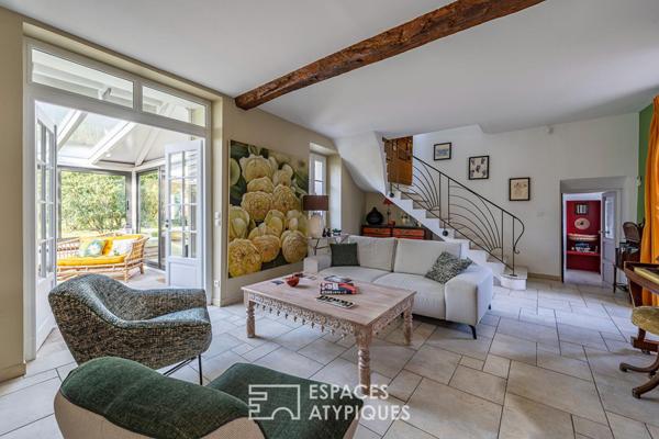 Corps de ferme rénové au coeur du village et son jardin secret