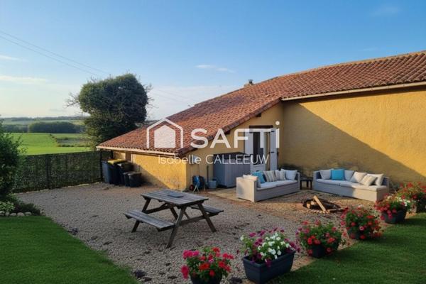 Maison ancienne aux murs épais, vue dégagée, jardin agréable, village accessible à pied, stationnement camping-car, garage, DPE E.