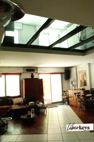 Un appartement duplex en RDC / 1er étage de 4 pièces de 106 m² avec Terrasses/balcons - M° Crimée - Paris 19ème