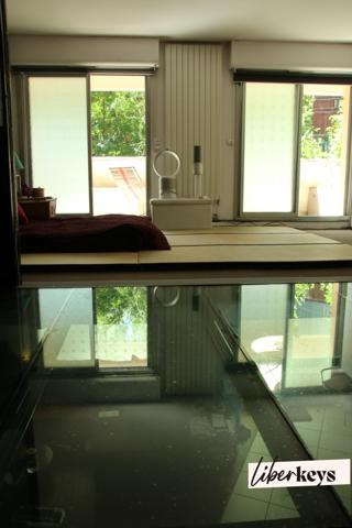 Un appartement duplex en RDC / 1er étage de 4 pièces de 106 m² avec Terrasses/balcons - M° Crimée - Paris 19ème