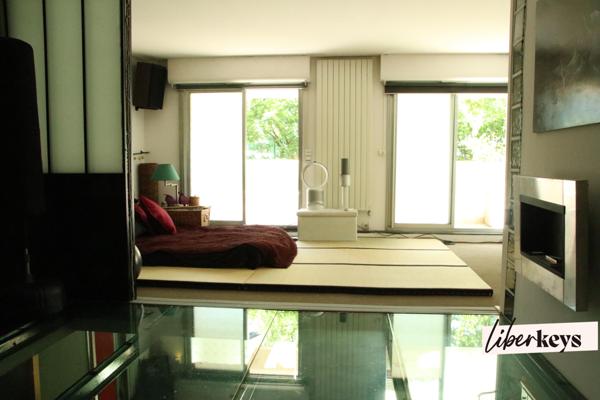 Un appartement duplex en RDC / 1er étage de 4 pièces de 106 m² avec Terrasses/balcons - M° Crimée - Paris 19ème