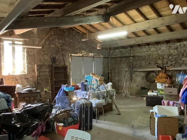 maison à rénover avec garage et terrain