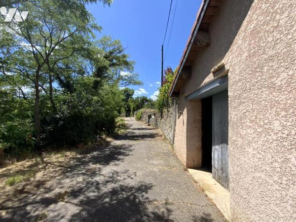 maison à rénover avec garage et terrain