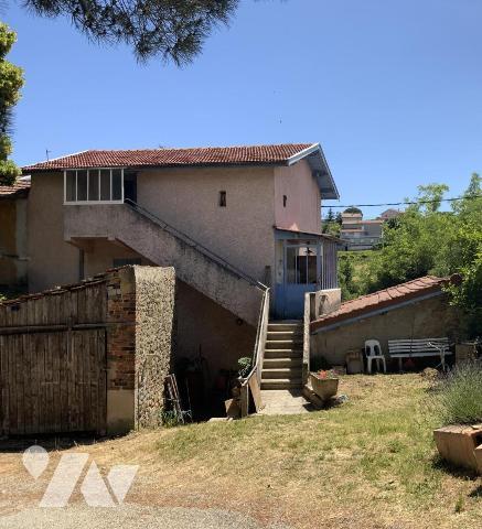 maison à rénover avec garage et terrain