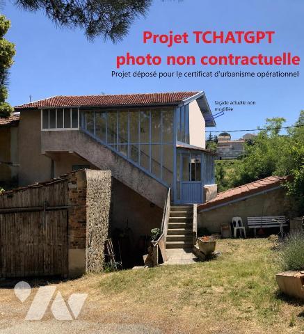 maison à rénover avec garage et terrain