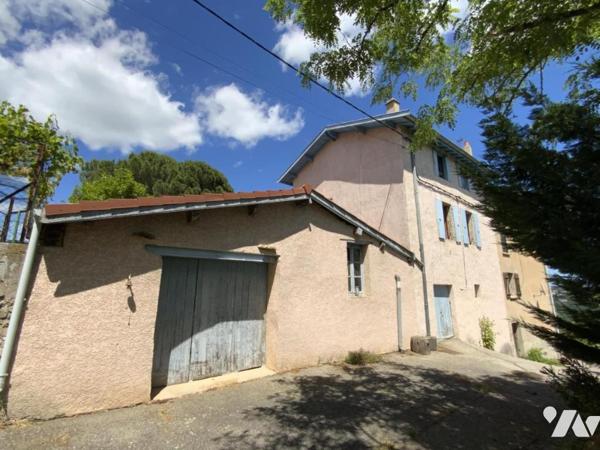 maison à rénover avec garage et terrain