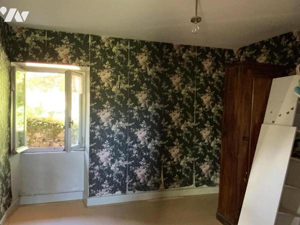 maison à rénover avec garage et terrain