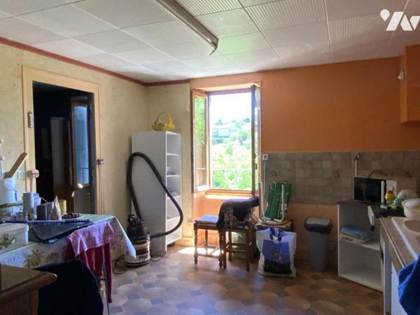 maison à rénover avec garage et terrain