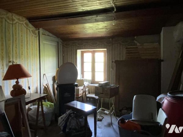 maison à rénover avec garage et terrain