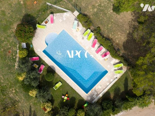 MAS EN PIERRE AVEC DEPENDANCES PISCINE ET TERRAIN A VAISON LA ROMAINE