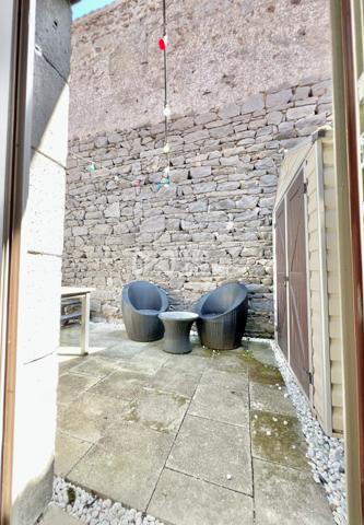 Maison de ville de type 3 avec garage, terrasse et jardinet
