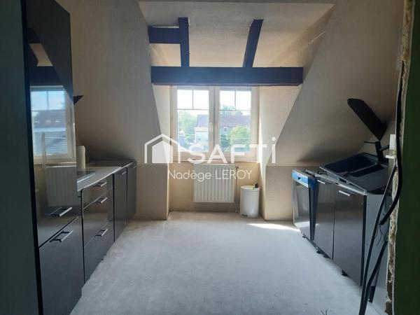 2 chambres,  1 bureau et une place de parking