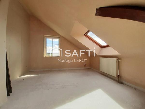 2 chambres,  1 bureau et une place de parking